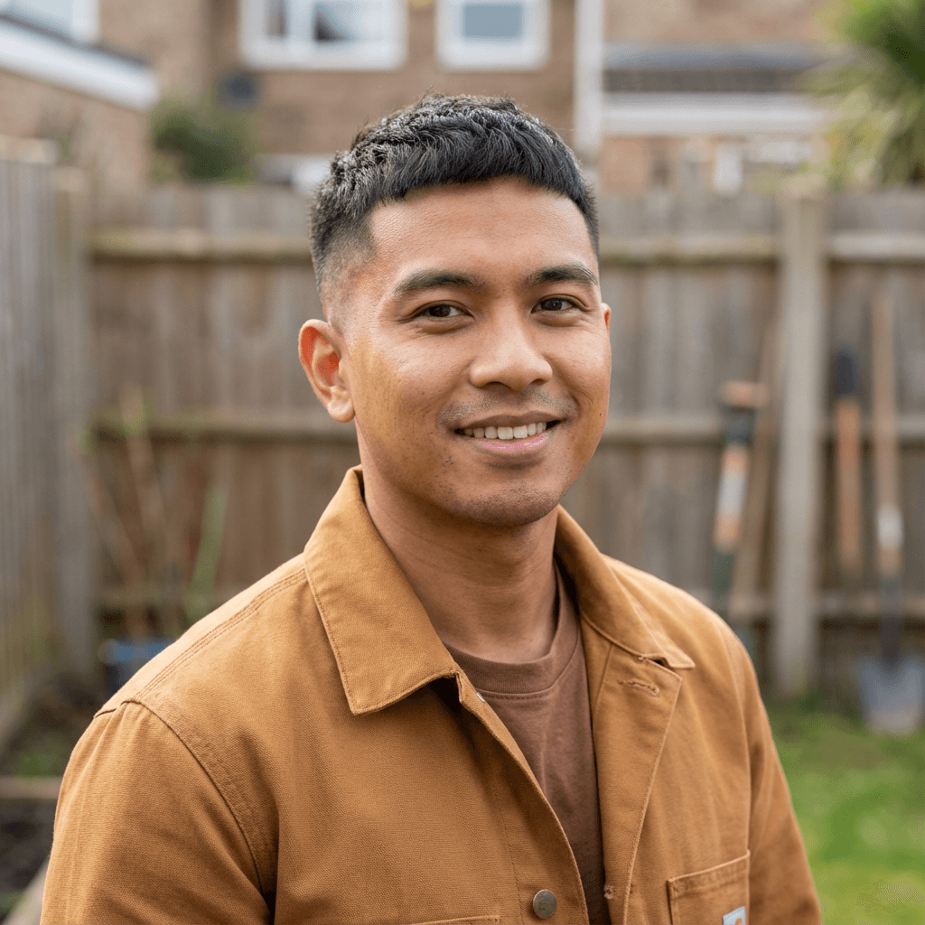 David Park, a male homeowner in his mid 30s, standing in his home office